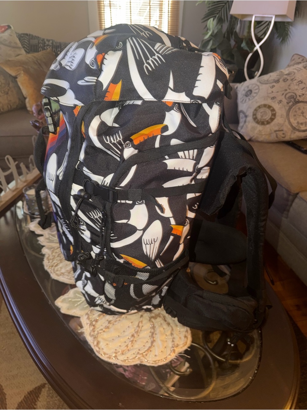 FARM Rio Black Toucan Pattern Backpack with Orange Beak Accents